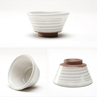 small white ceramic tea cup