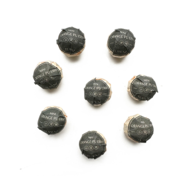 Green Orange Pu Erh ‘Xin Hui Xiao Qing Gan’ - Ripe Pu Erh Stuffed in Small Tangerine